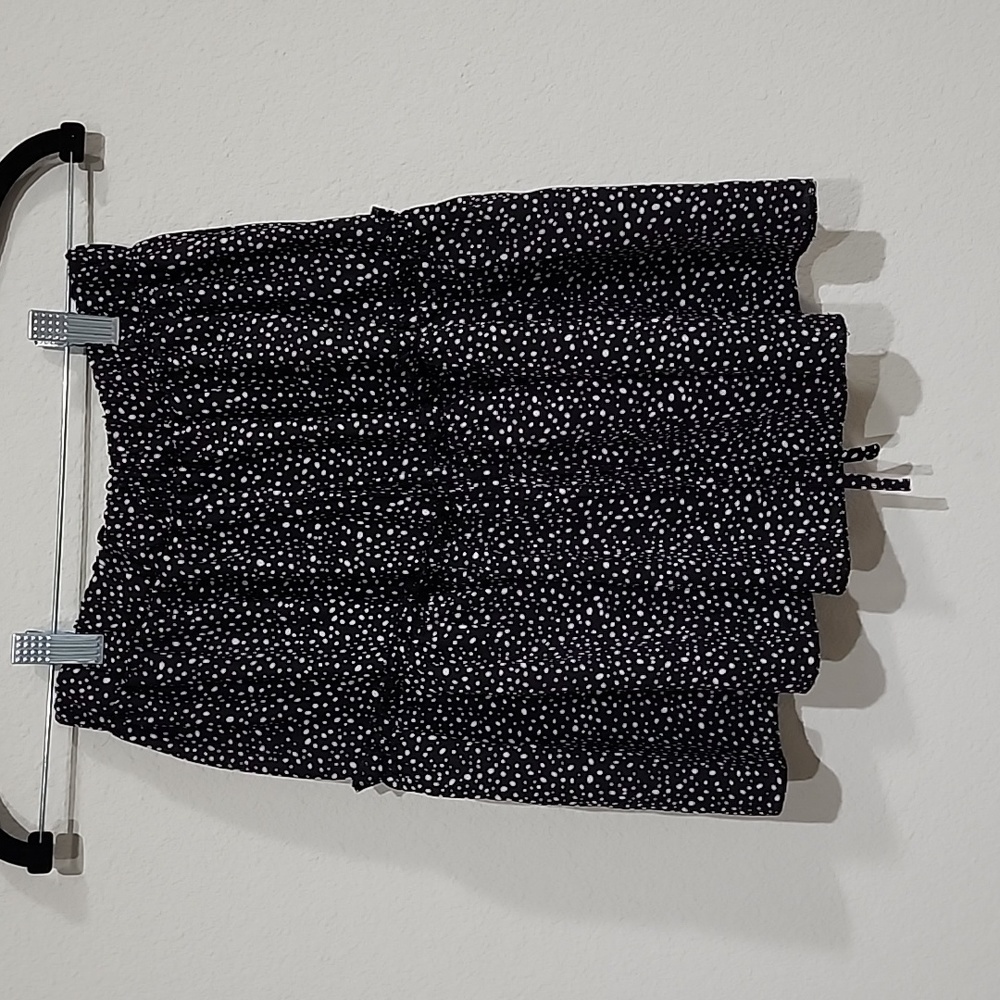 NWOT. mini skirt size small. Black and white polka dot